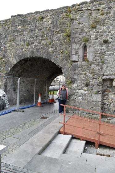 Standing by the Spanish Arches in Galway.